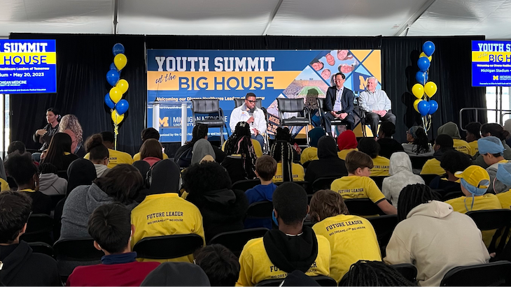 A panel discussion at the Youth Summit at the Big House